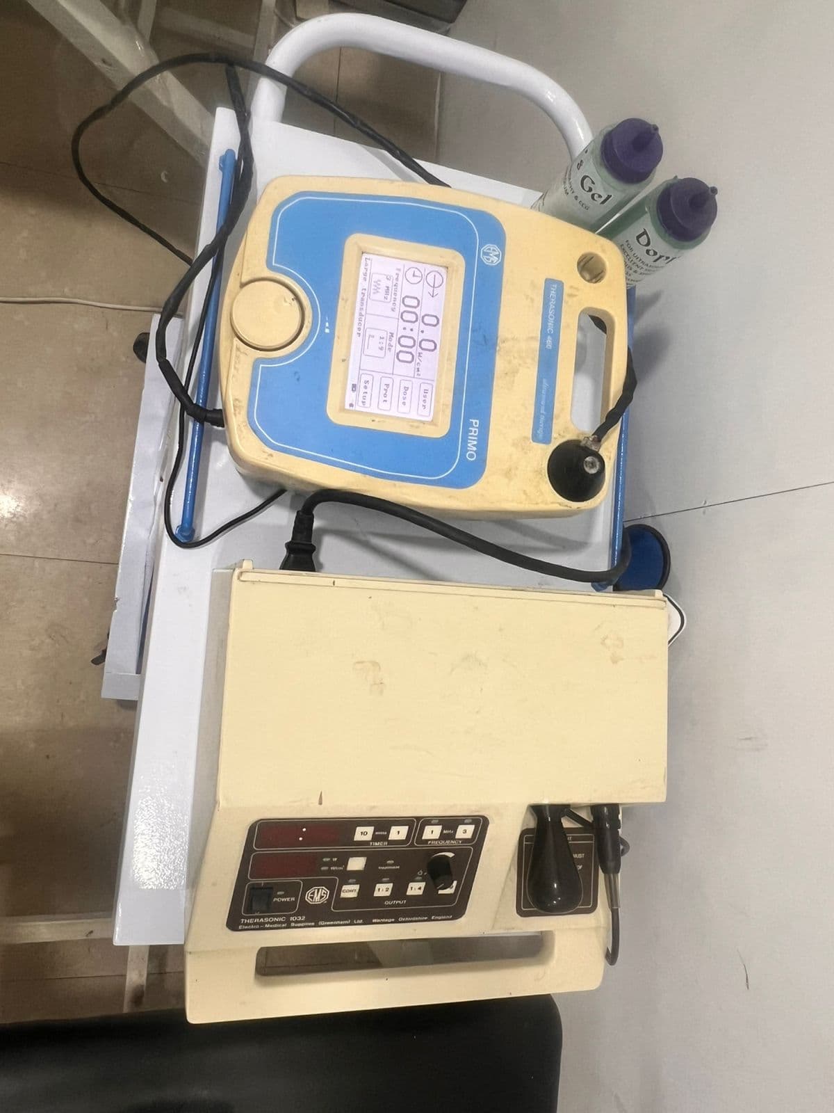 Therasonic ultrasound therapy devices on a clinic trolley with coupling gel